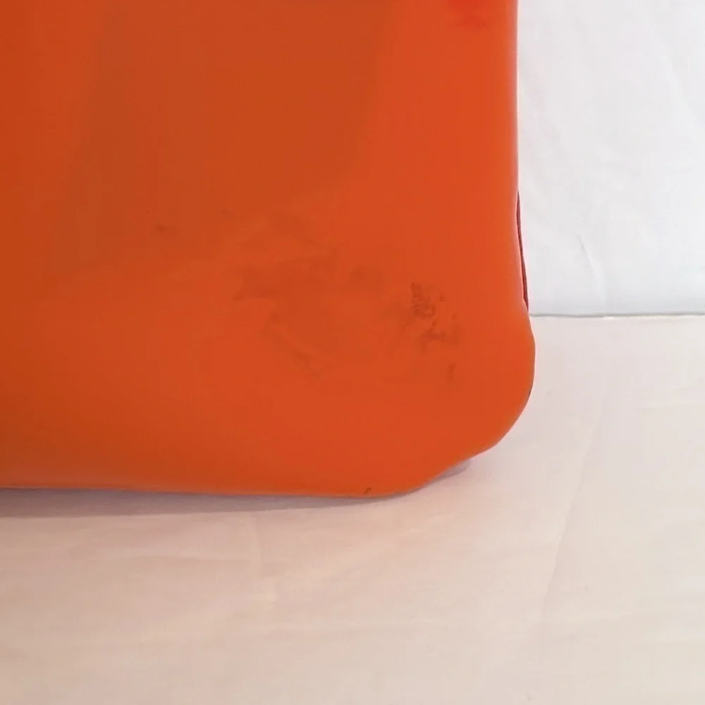 The Revlon x Megan Thee Stallion makeup bag with oversized zipper